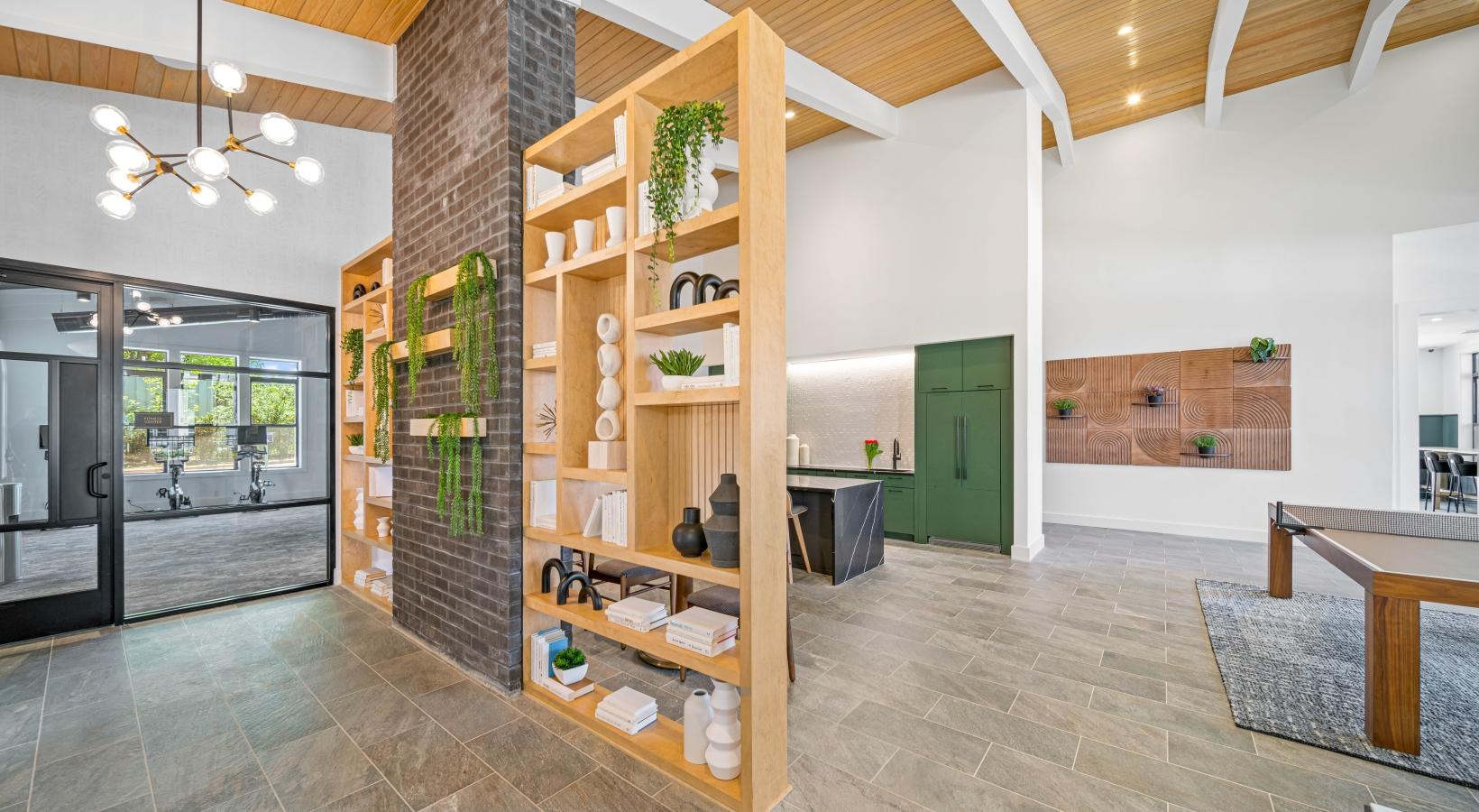 Thoughtful details to elevate your lifestyle a room with shelves and a table