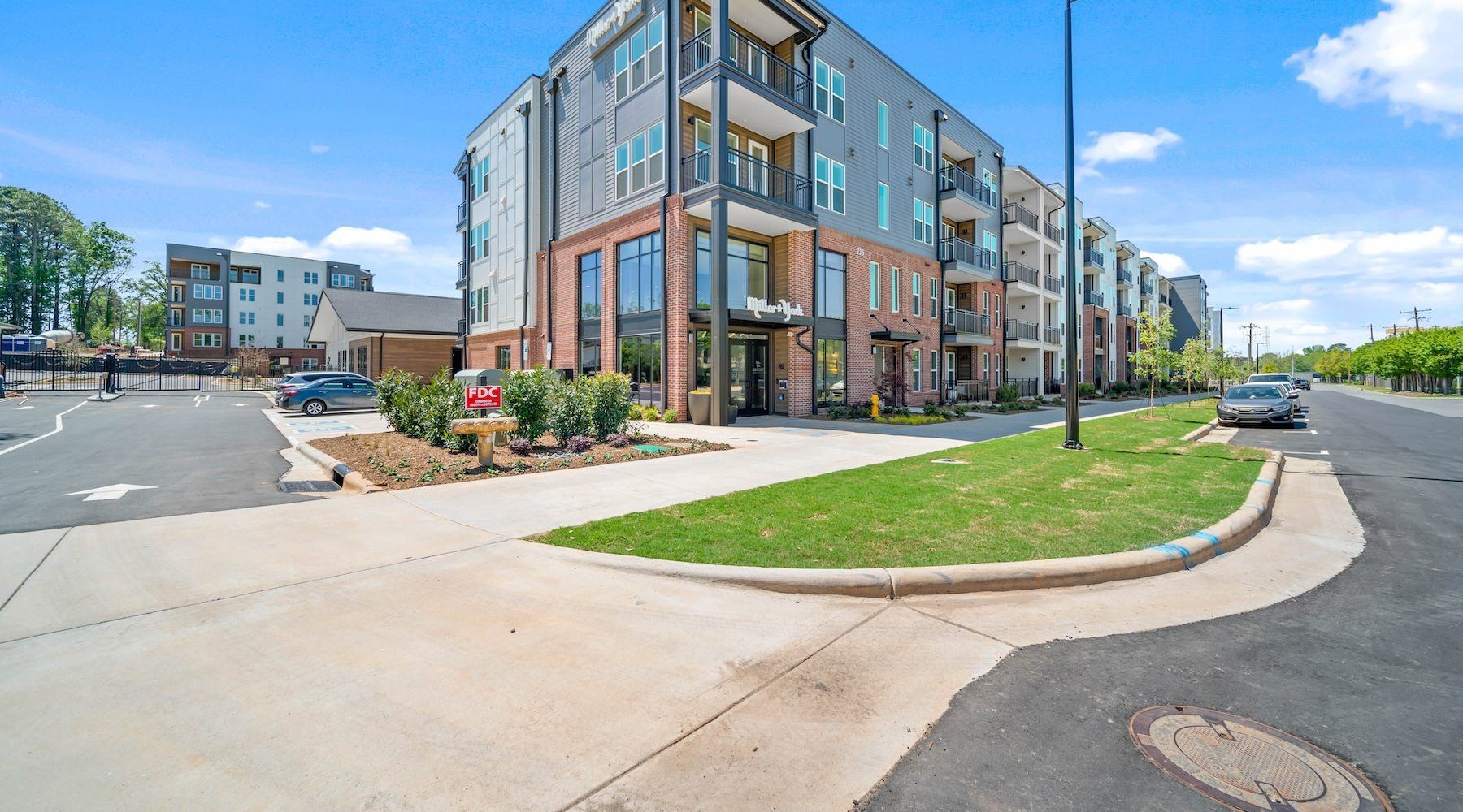 Settle into comfort at Miller and York a building with a parking lot