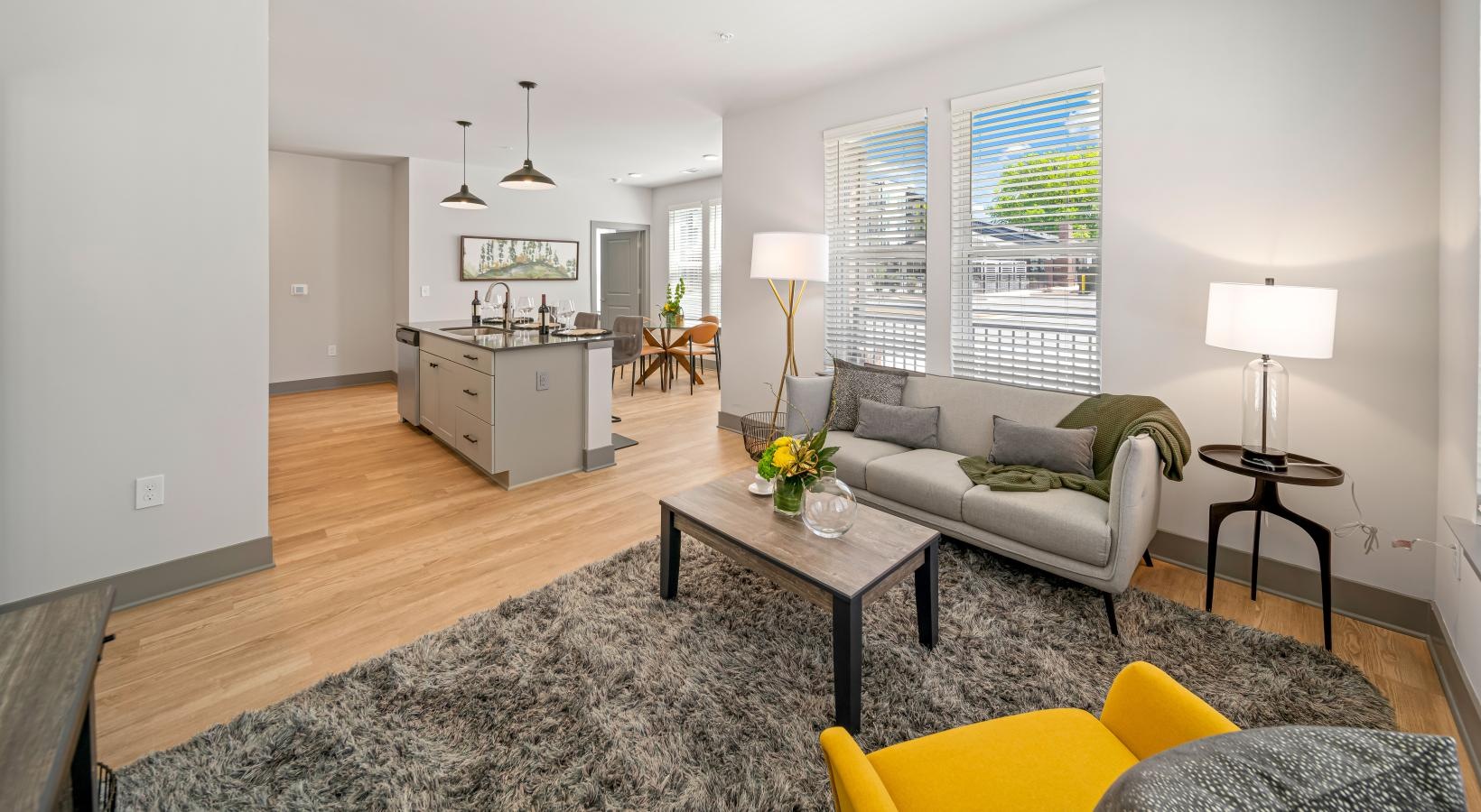 Gorgeous living areas to entertain and enjoy a living room with a wood floor