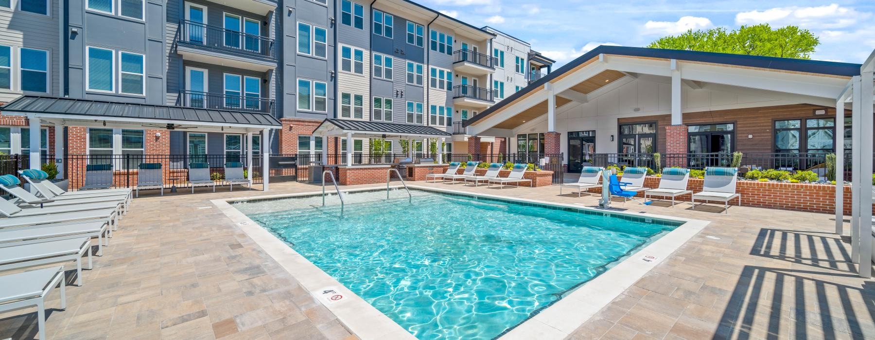 a swimming pool outside of a building