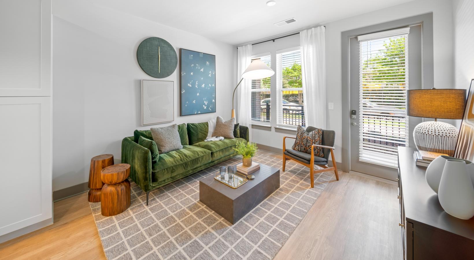 Beautiful bedrooms to fit every need a living room with a green couch