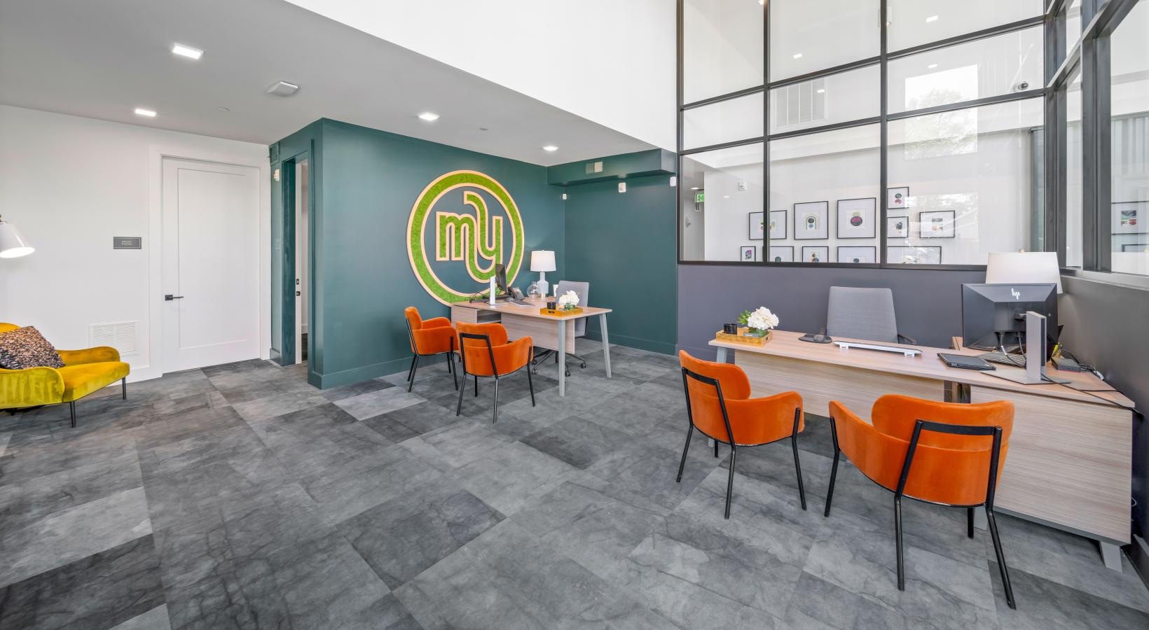 Enjoy our resident-only features a room with a table chairs and a window