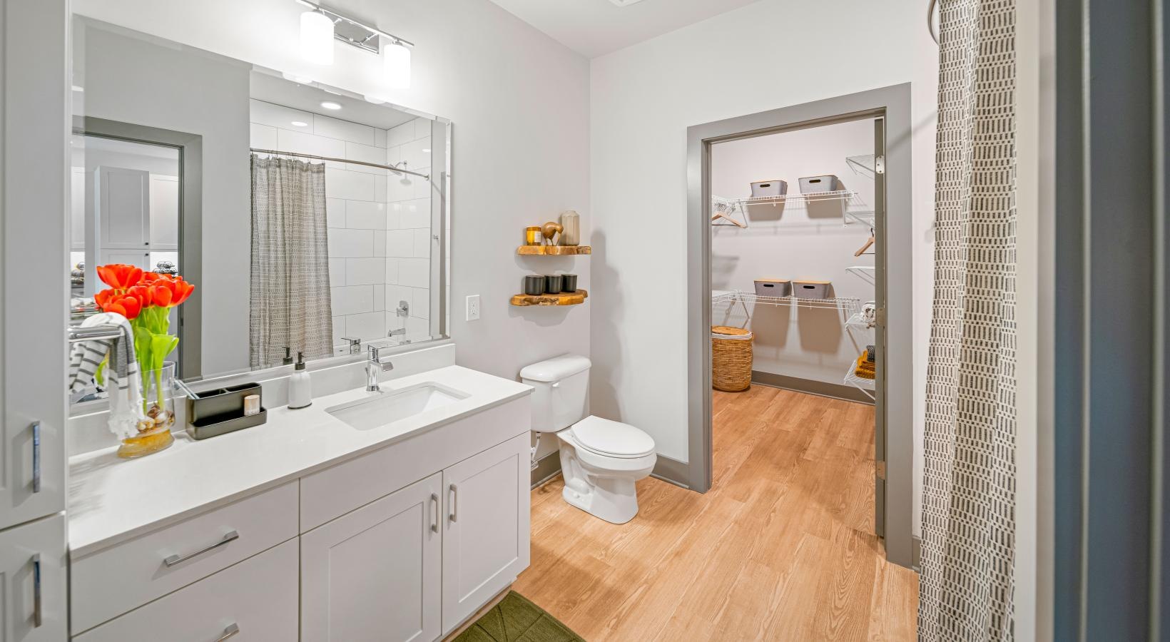 Spacious bathrooms with everything you need a bathroom with a tub sink and toilet