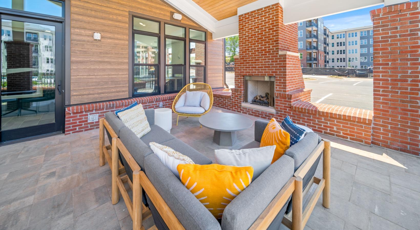 Access to resident-only features a living room with a fireplace