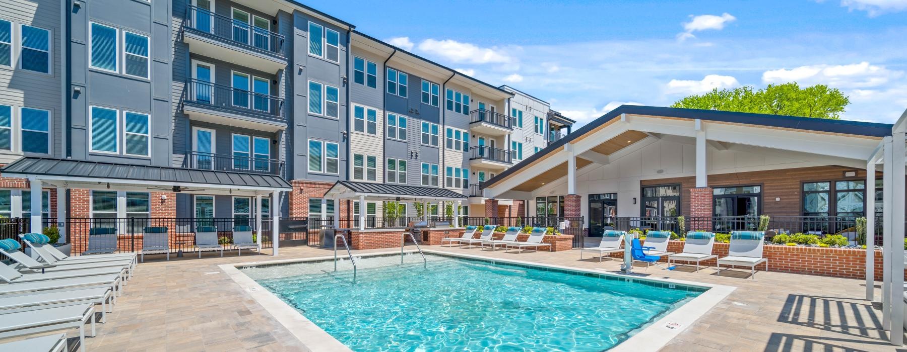 a swimming pool outside of a building