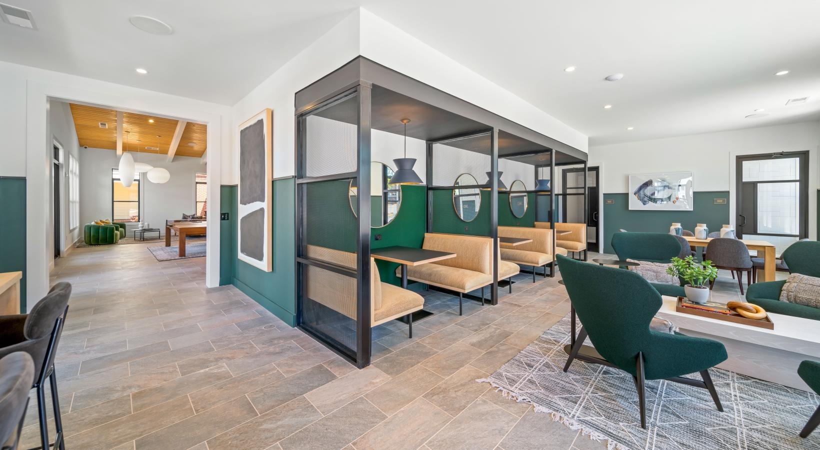 Access to resident-only features a room with a glass wall and a table with chairs and a glass door