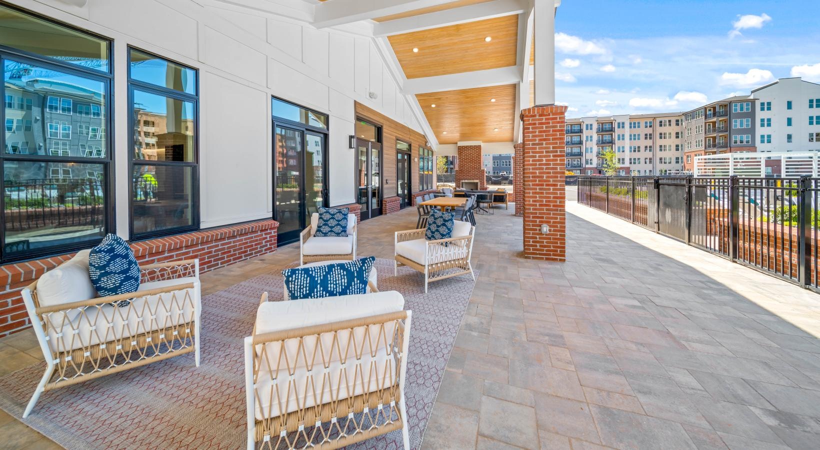 Enjoy our resident-only features a patio with chairs and tables